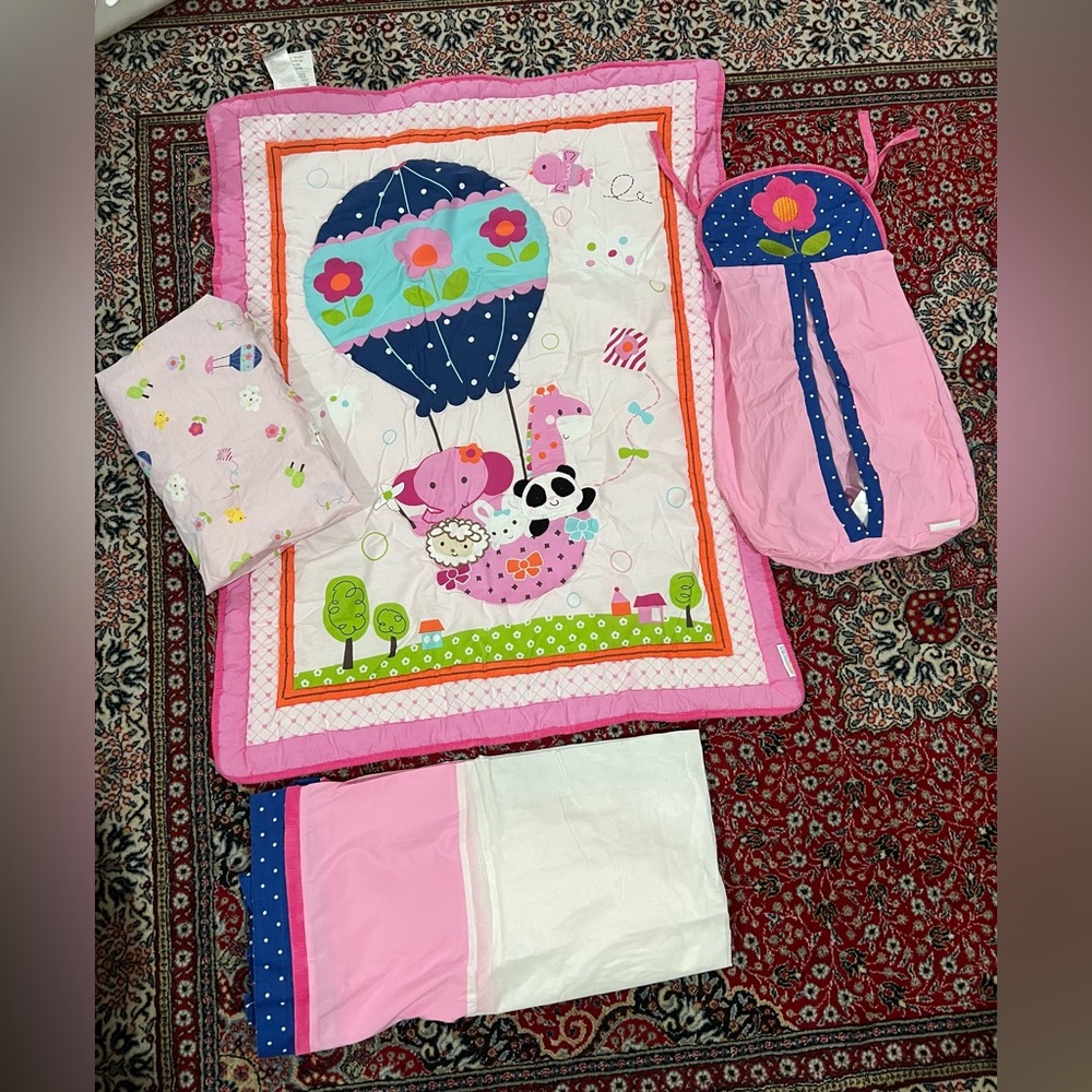 Baby crib sheets set with diaper holder